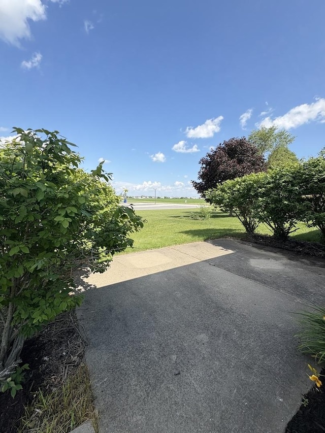 1412 Sherborn Ct, Minooka, IL 60447 - view of green lawn with a patio