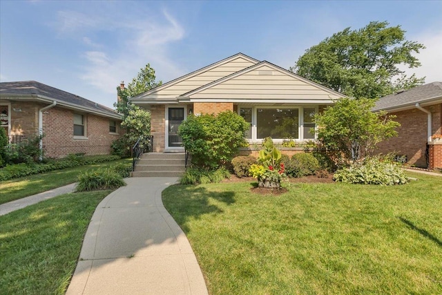 7418 Kildare Ave, Skokie, IL 60076 - view of front of property featuring a front lawn and brick siding