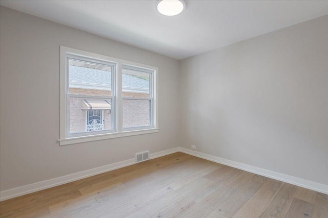 7418 Kildare Ave, Skokie, IL 60076 - unfurnished room featuring light wood-style flooring and baseboards