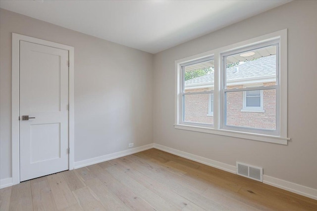 7418 Kildare Ave, Skokie, IL 60076 - spare room featuring light wood-style flooring and baseboards