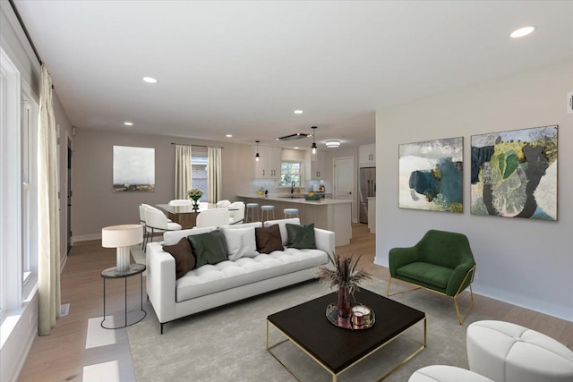 7418 Kildare Ave, Skokie, IL 60076 - living room with recessed lighting and light wood-type flooring