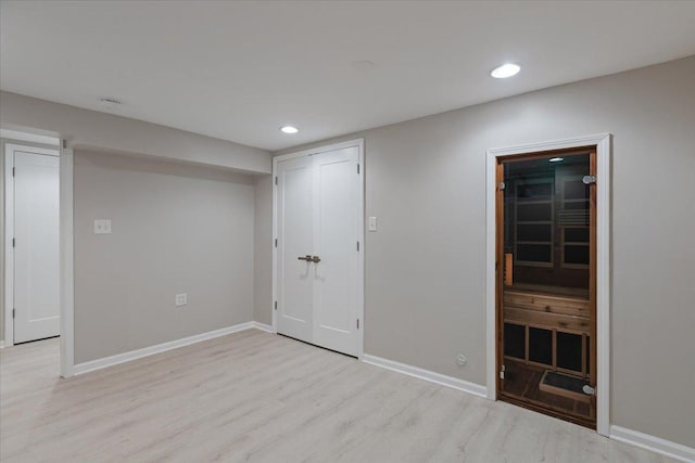 7418 Kildare Ave, Skokie, IL 60076 - finished below grade area featuring wood finished floors and recessed lighting