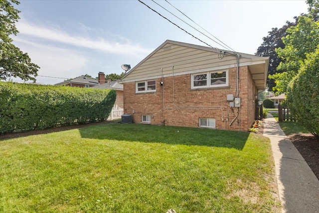7418 Kildare Ave, Skokie, IL 60076 - view of home's exterior featuring a yard and brick siding