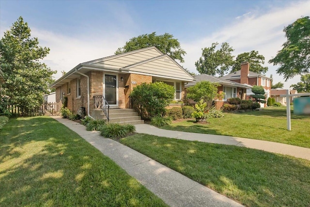 7418 Kildare Ave, Skokie, IL 60076 - view of front facade with a front lawn and brick siding