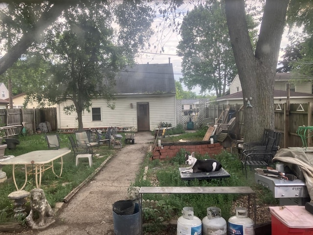 1403 Barberry Ln, Round Lake Beach, IL 60073 - back of property featuring a fenced backyard