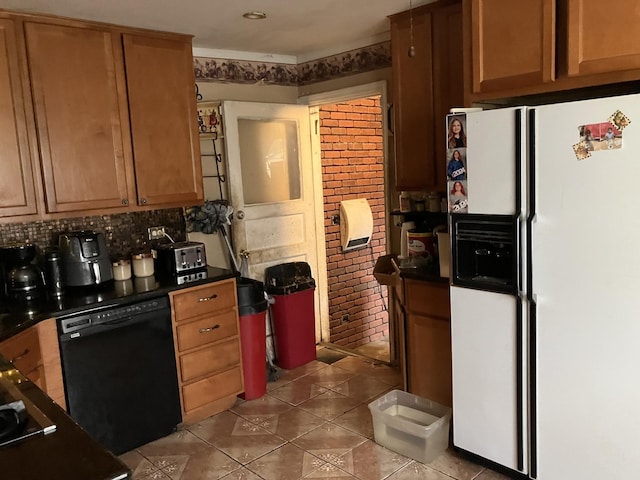 1403 Barberry Ln, Round Lake Beach, IL 60073 - kitchen featuring white fridge with ice dispenser, black dishwasher, tile patterned flooring, and dark countertops