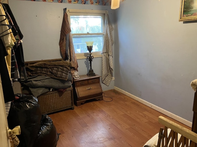 1403 Barberry Ln, Round Lake Beach, IL 60073 - bedroom featuring light wood-type flooring and baseboards