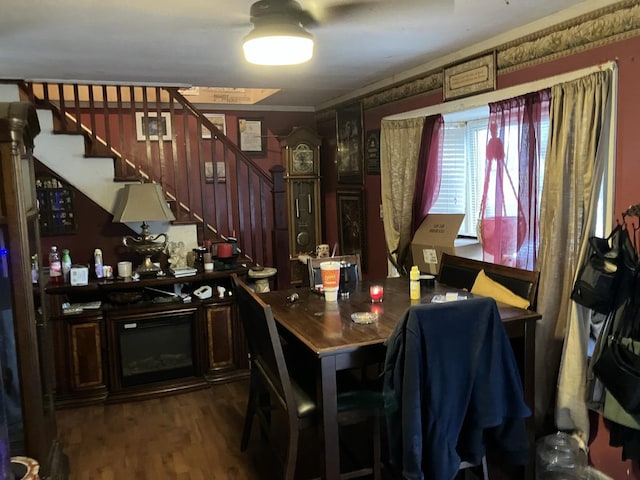 1403 Barberry Ln, Round Lake Beach, IL 60073 - dining space with stairs and dark wood-style floors