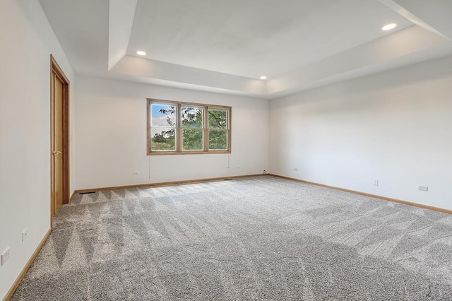 2504 Monterey Dr, Plainfield, IL 60586 - carpeted empty room featuring a tray ceiling and recessed lighting
