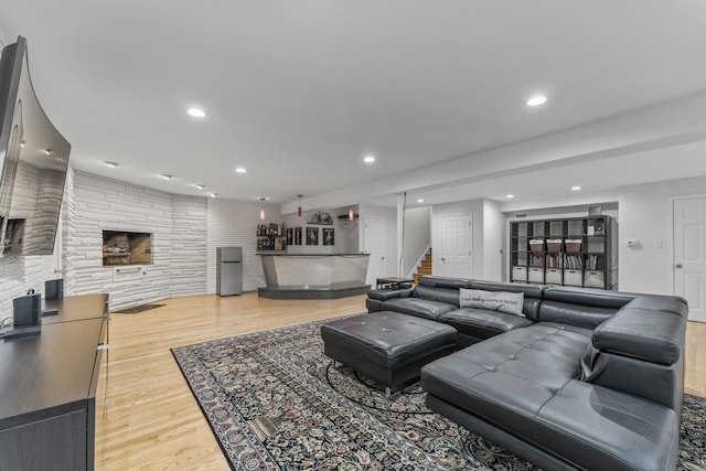 3257 N Nottingham Ave, Chicago, IL 60634 - living area with a bar, stairway, recessed lighting, and light wood finished floors