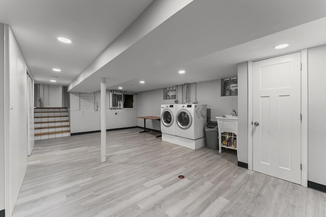 3257 N Nottingham Ave, Chicago, IL 60634 - laundry room with washer and dryer, wood finished floors, electric panel, and recessed lighting