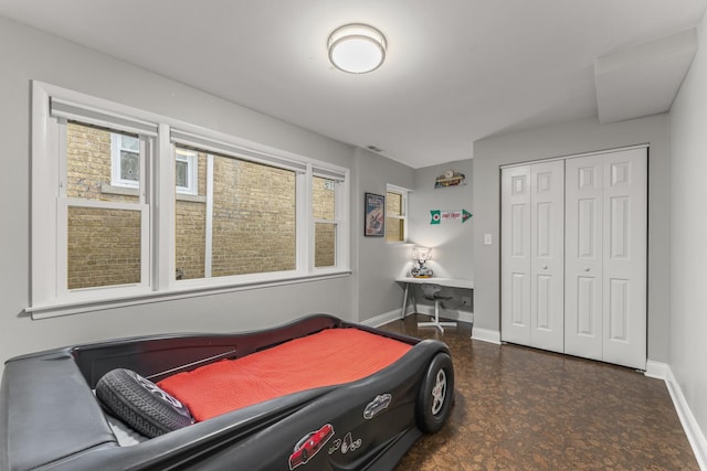 3257 N Nottingham Ave, Chicago, IL 60634 - bedroom featuring baseboards and a closet