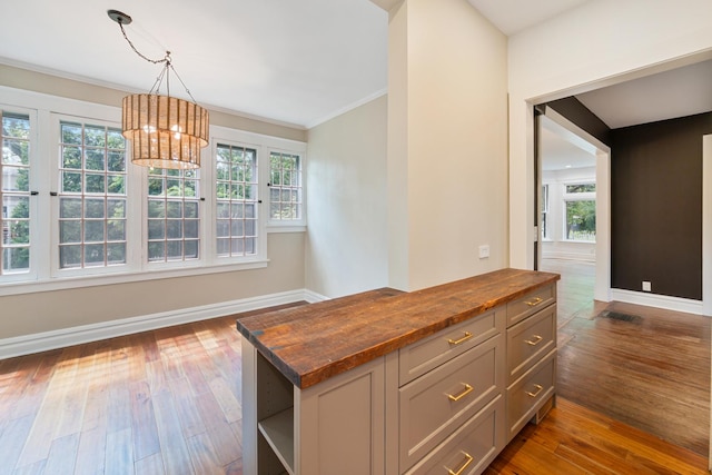 1123 Linden Ave, Wilmette, IL 60091 - interior space featuring dark wood-style flooring, a chandelier, healthy amount of natural light, and ornamental molding