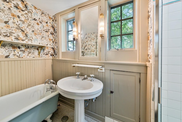 1123 Linden Ave, Wilmette, IL 60091 - bathroom with wainscoting, a soaking tub, and wallpapered walls