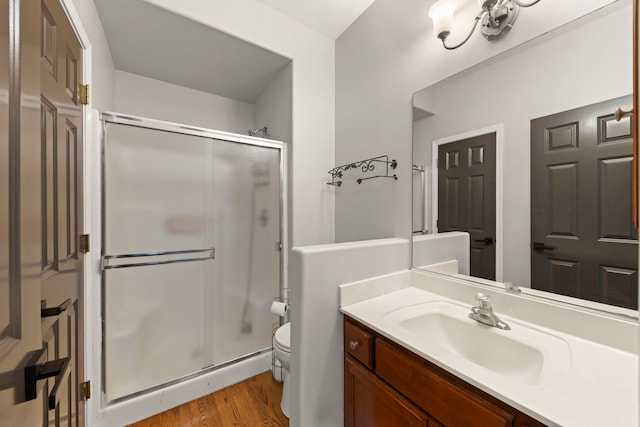 24006 Skyler Ln, Plainfield, IL 60586 - full bathroom featuring a shower stall, vanity, and wood finished floors