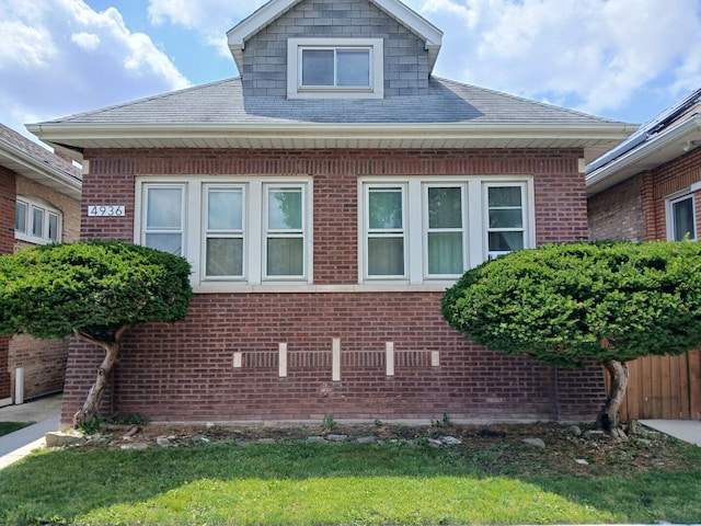 4936 S Karlov Ave, Chicago, IL 60632 - view of side of property with brick siding and a shingled roof