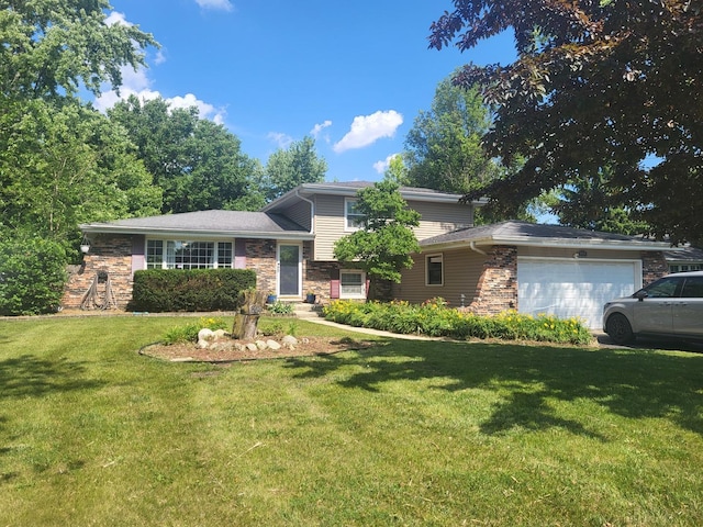 604 Parkshore Dr, Shorewood, IL 60404 - tri-level home featuring an attached garage and a front yard
