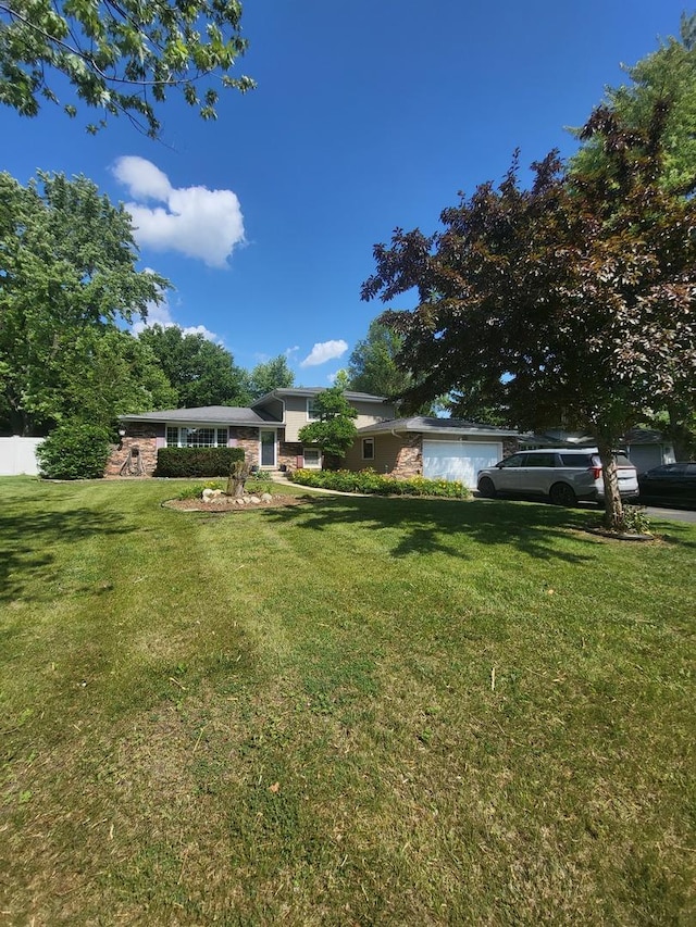 604 Parkshore Dr, Shorewood, IL 60404 - view of front of house featuring a garage and a front lawn