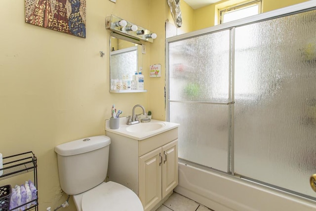 3810 W Ohio St, Chicago, IL 60624 - bathroom featuring vanity, shower / bath combination with glass door, and tile patterned flooring