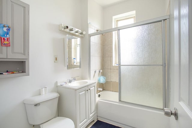 3810 W Ohio St, Chicago, IL 60624 - bathroom featuring vanity and bath / shower combo with glass door