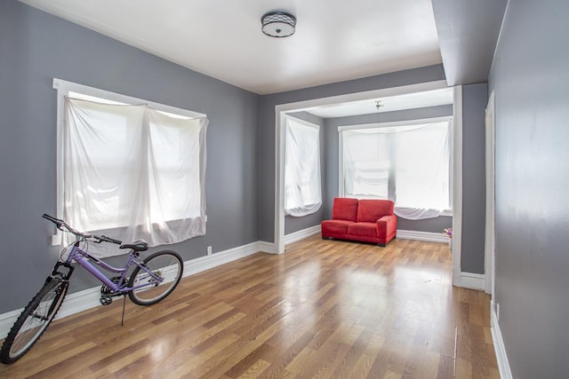 3810 W Ohio St, Chicago, IL 60624 - sitting room with wood finished floors and baseboards