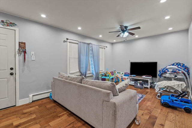 14501 Keystone Ave Unit 8, Midlothian, IL 60445 - living room featuring baseboard heating, recessed lighting, ceiling fan, and wood finished floors