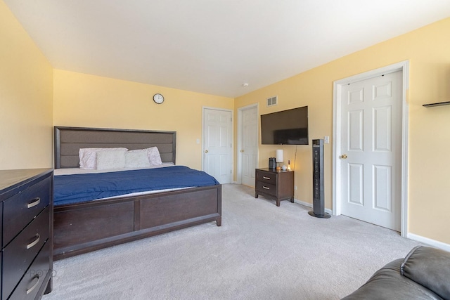 2012 Juniper Ct Unit 2012, Glendale Heights, IL 60139 - bedroom featuring light carpet and baseboards