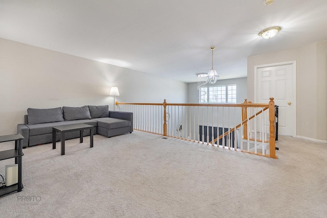 2012 Juniper Ct Unit 2012, Glendale Heights, IL 60139 - living room with carpet floors and a chandelier