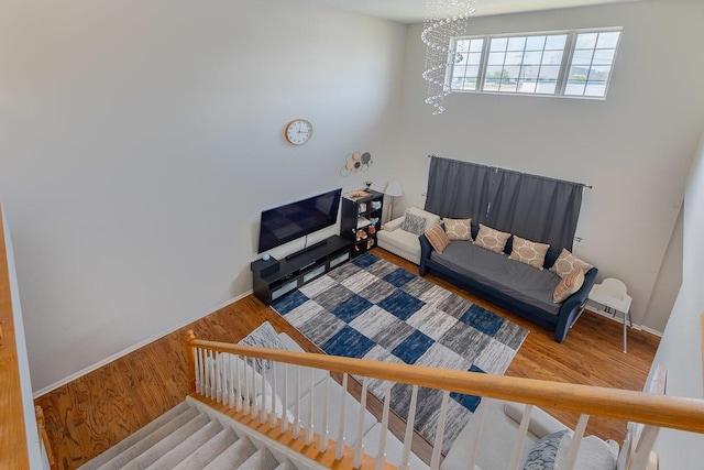 2012 Juniper Ct Unit 2012, Glendale Heights, IL 60139 - living room with wood finished floors, a chandelier, and stairs