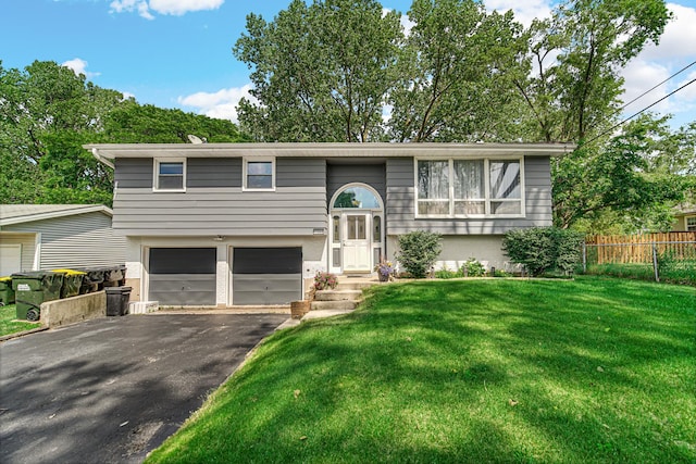 1306 Monroe St, Lake In The Hills, IL 60156 - split foyer home with a garage and asphalt driveway