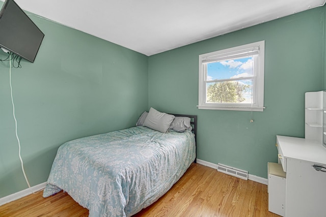 1306 Monroe St, Lake In The Hills, IL 60156 - bedroom with light wood-type flooring