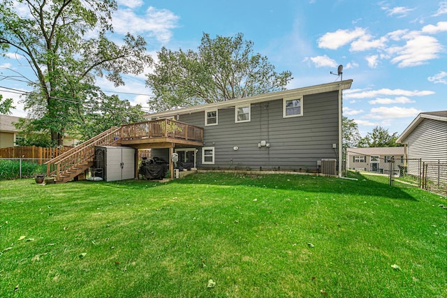 1306 Monroe St, Lake In The Hills, IL 60156 - rear view of property featuring stairway, a deck, a fenced backyard, and a gate