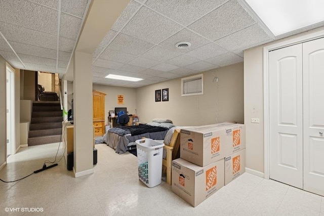 1127 Alpine Ln, Lemont, IL 60439 - finished below grade area featuring a drop ceiling, light floors, and stairway