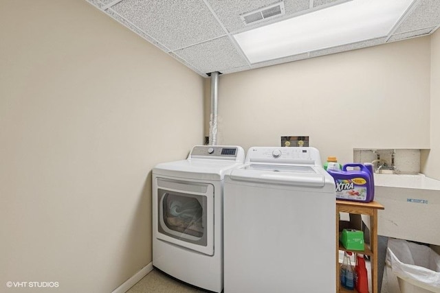 1127 Alpine Ln, Lemont, IL 60439 - laundry room with washer and clothes dryer and baseboards