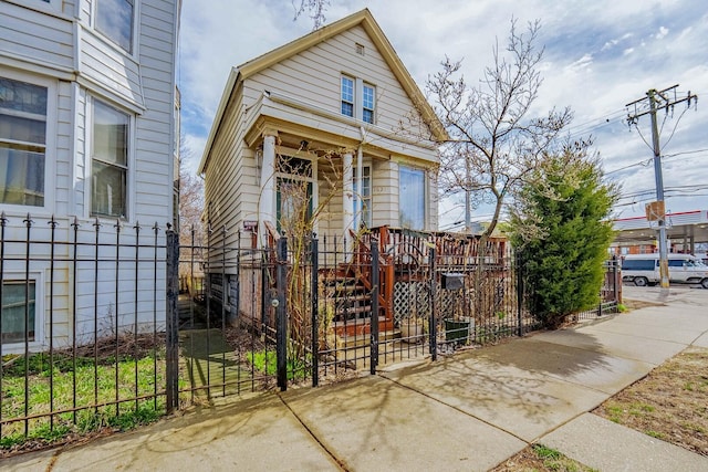1621 N Central Park Ave, Chicago, IL 60647 - view of front of home with a fenced front yard and a gate