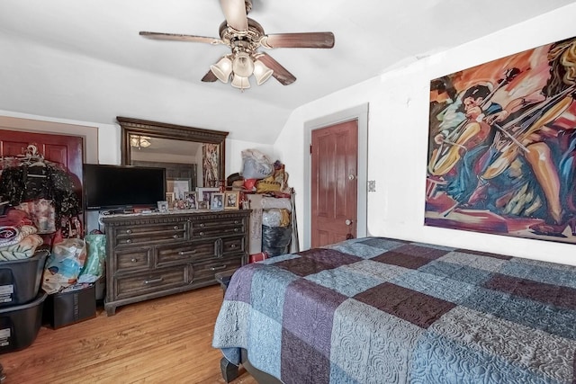 1621 N Central Park Ave, Chicago, IL 60647 - bedroom with wood finished floors, ceiling fan, and vaulted ceiling