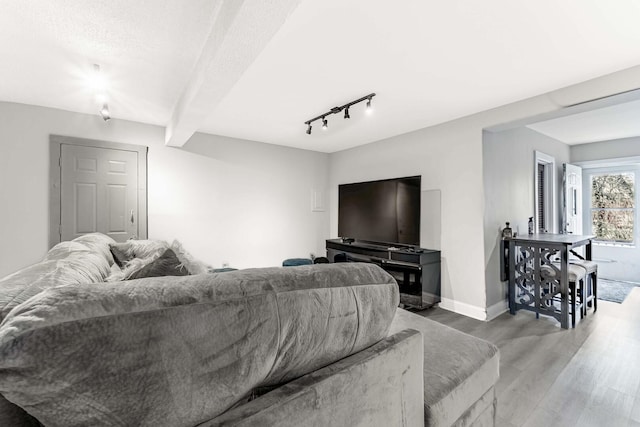 1621 N Central Park Ave, Chicago, IL 60647 - living area with wood finished floors and rail lighting
