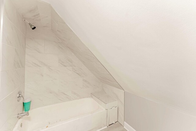 1621 N Central Park Ave, Chicago, IL 60647 - bathroom featuring tub / shower combination and lofted ceiling