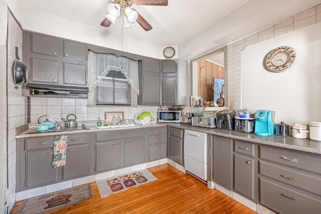 1621 N Central Park Ave, Chicago, IL 60647 - kitchen featuring gray cabinets, white dishwasher, a ceiling fan, and stainless steel microwave