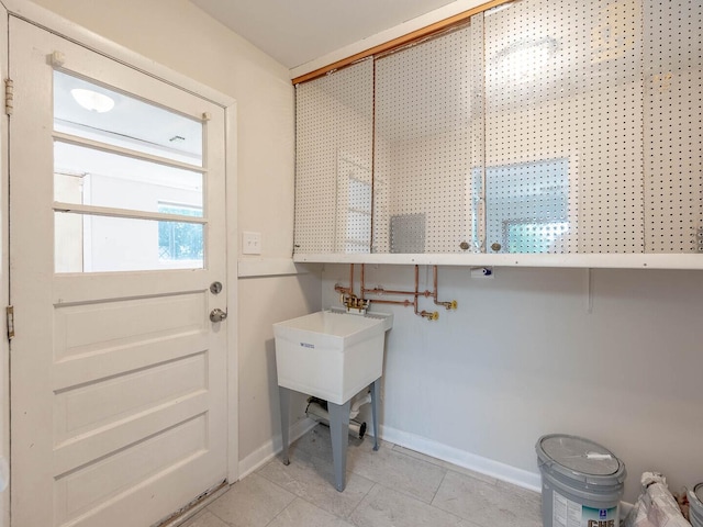 15117 La Crosse Ave, Oak Forest, IL 60452 - laundry area featuring baseboards and light tile patterned floors