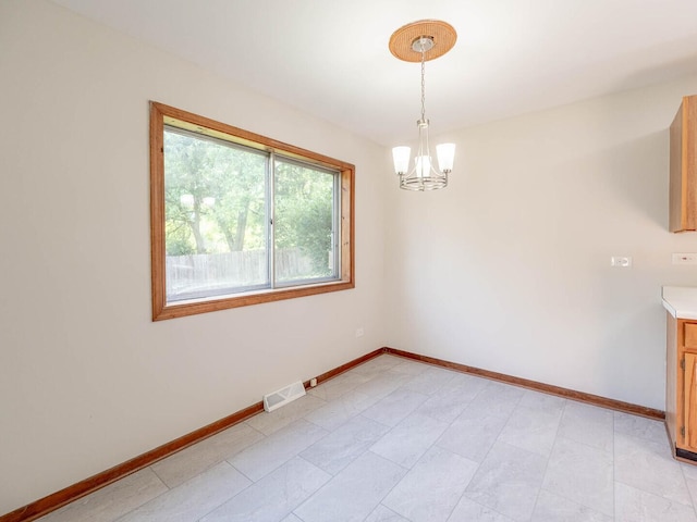 15117 La Crosse Ave, Oak Forest, IL 60452 - unfurnished room with a chandelier and baseboards