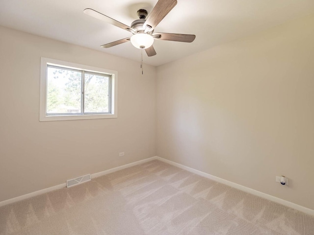 15117 La Crosse Ave, Oak Forest, IL 60452 - empty room featuring light colored carpet and ceiling fan