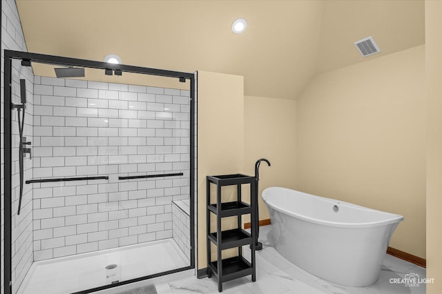 23 Colony Ct, Yorkville, IL 60560 - bathroom with marble look tile flooring, a freestanding bath, a stall shower, and vaulted ceiling