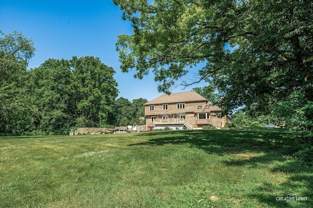 23 Colony Ct, Yorkville, IL 60560 - view of grassy yard featuring a wooden deck