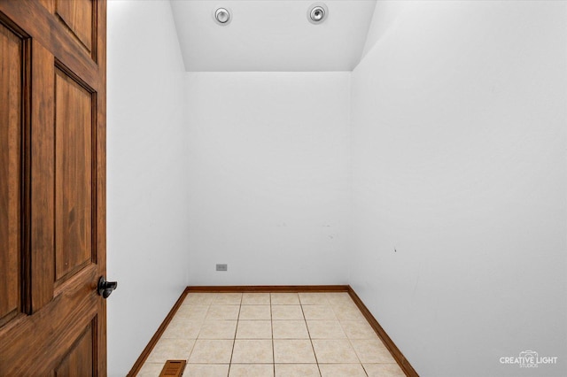 23 Colony Ct, Yorkville, IL 60560 - empty room featuring light tile patterned floors and baseboards