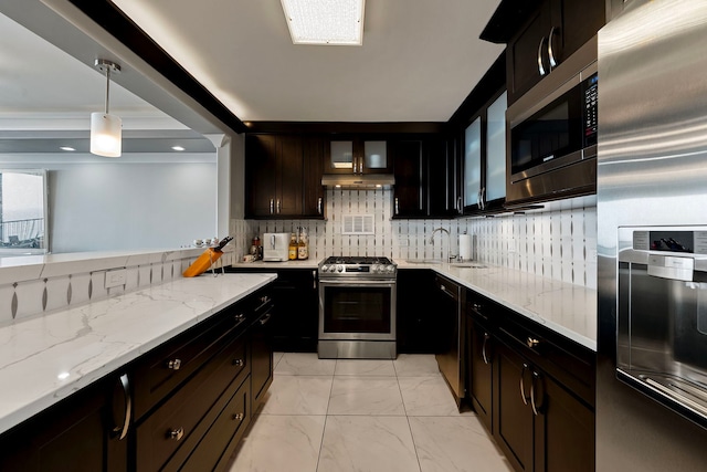400 E Randolph St Unit 2603, Chicago, IL 60601 - kitchen featuring stainless steel appliances, under cabinet range hood, light marble finish floors, and light stone counters