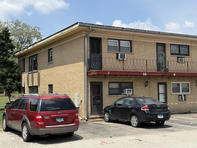 38 King Arthur Ct Unit 14, Northlake, IL 60164 - view of building exterior featuring uncovered parking