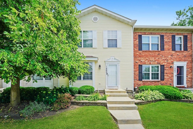 1484 Joshel Ct, Geneva, IL 60134 - multi unit property featuring a front yard and brick siding