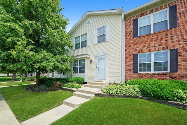 1484 Joshel Ct, Geneva, IL 60134 - view of front of home with a front lawn and brick siding