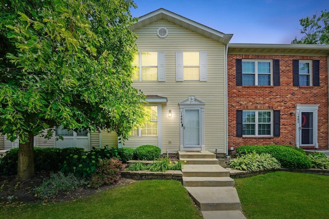 1484 Joshel Ct, Geneva, IL 60134 - view of front of house featuring a front yard and brick siding